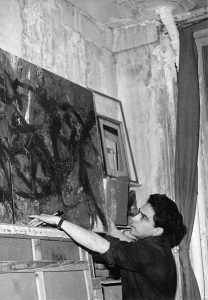 Oswaldo Vigas in his studio at the Hotel D'Aubusson, Paris, 1964