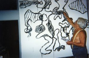 Oswaldo Vigas painting in his studio in Los Dos Caminos, Caracas, 2001