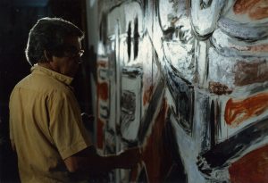 Oswaldo Vigas painting his artwork Genesis in his studio in Los Dos Caminos, Caracas, 1980