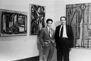 Oswaldo Vigas and the art critic, José Gómez Sicre in the solo show of Oswaldo Vigas in the Pan-American Union, Washington D.C., 1957