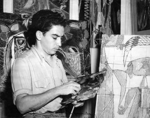 Oswaldo Vigas in his studio at Hotel Lucero in Caracas painting one of his Brujas, 1952