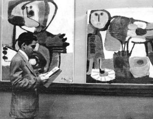 Oswaldo Vigas visiting an exhibition of contemporary Dutch masters in Caracas, 1950s